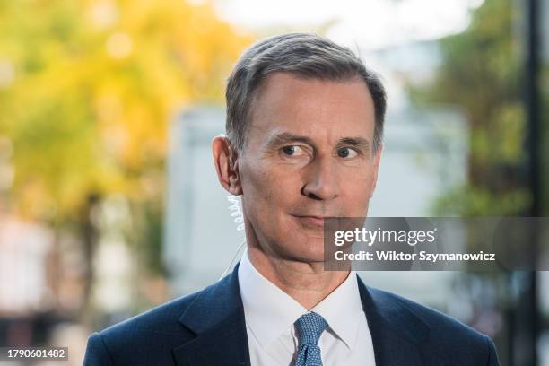 Chancellor of the Exchequer Jeremy Hunt gives an interview to the media outside the BBC Broadcasting House after attending the Sunday with Laura...