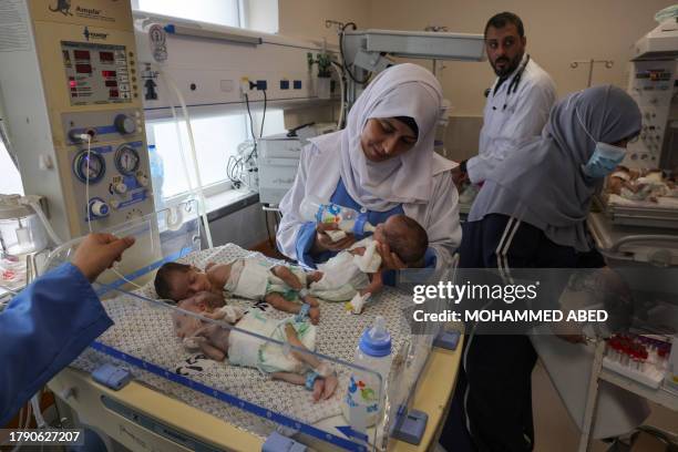 Palestinian medics care for premature babies evacuated from Al Shifa hospital to the Emirates hospital in Rafah in the southern Gaza Strip, on...