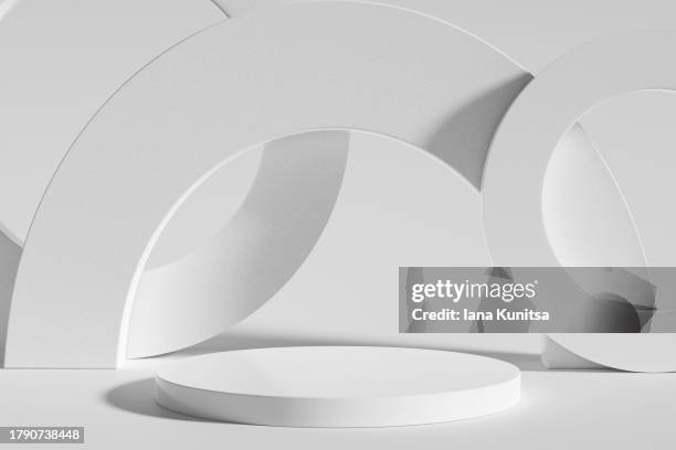 white cylinder podium, pedestal, platform for products presentation on monochrome background. futuristic 3d pattern. abstract geometric composition, design element. - theaterdecor stockfoto's en -beelden