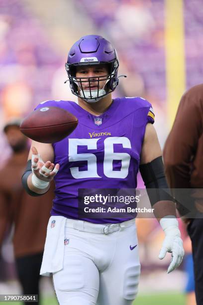 Garrett Bradbury of the Minnesota Vikings warms up before the game against New Orleans Saints at U.S. Bank Stadium on November 12, 2023 in...