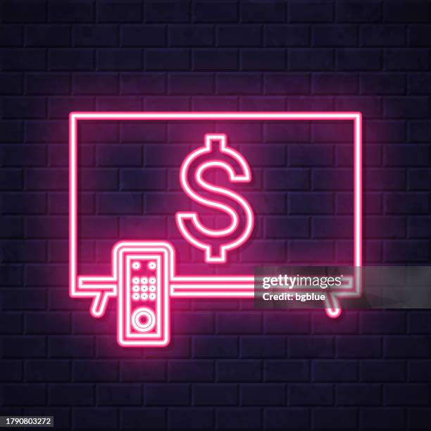 tv with dollar sign. glowing neon icon on brick wall background - flat screen stock illustrations