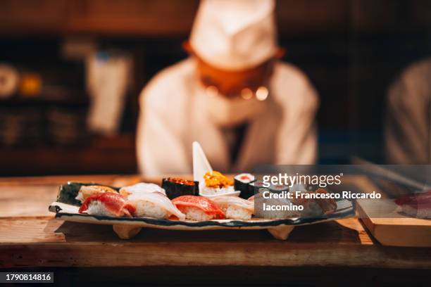 fresh gourmet sushi, omakase restaurant - sushi chef stock pictures, royalty-free photos & images