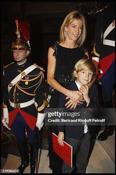 Madame Brice Hortefeux and child Amaury at The Gala Evening Celebrating The 35th Anniversary Of L'Arop At L'Opera Garnier In Paris.