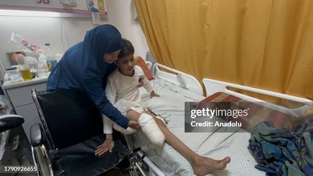 Saib Abu Muhadi , a Palestinian boy who was injured while playing football with his friends during the Israeli attacks on Gaza's Nasirat Refugee Camp...