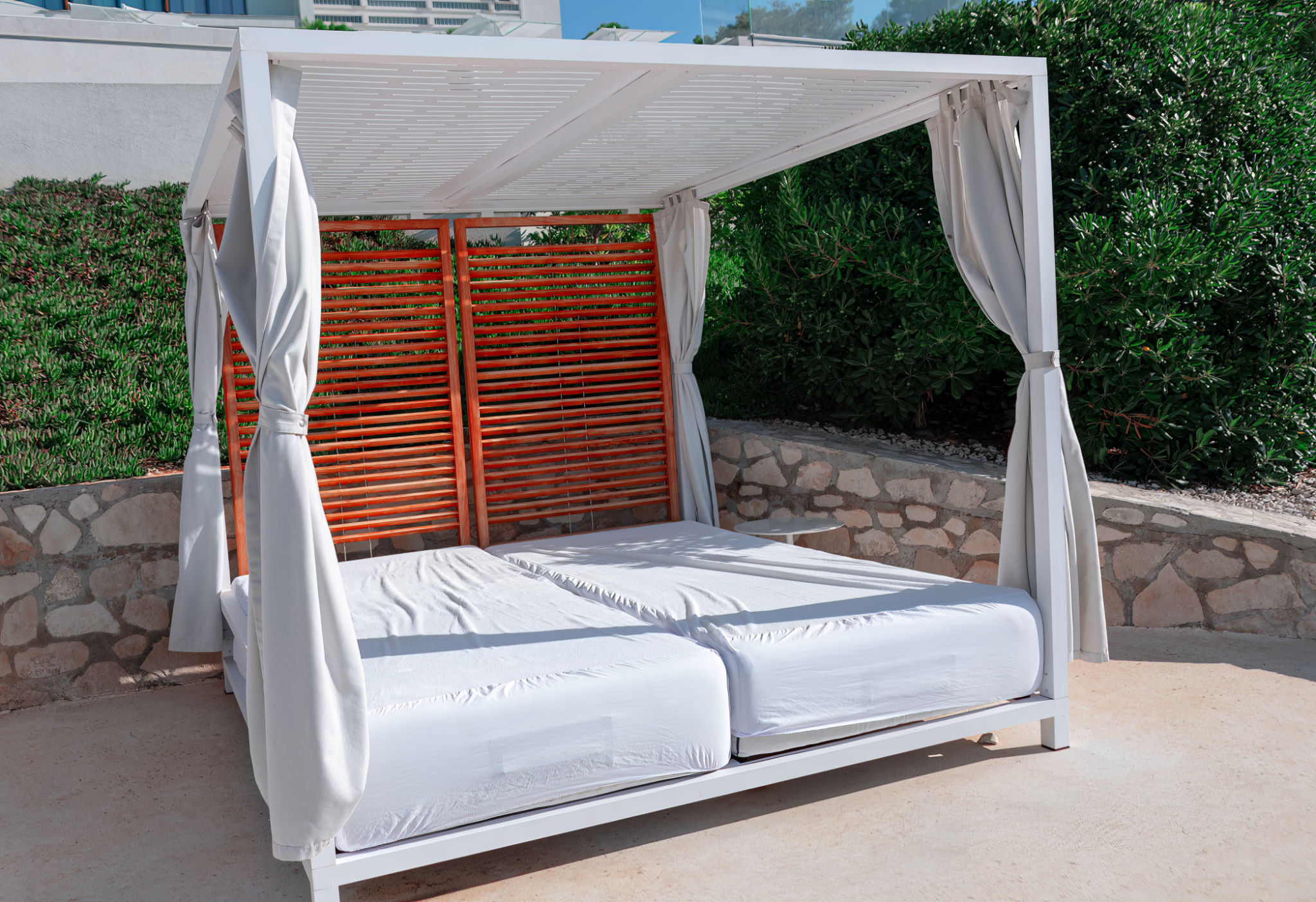 White canopy bed at coastal resort White canopy bed at coastal resort