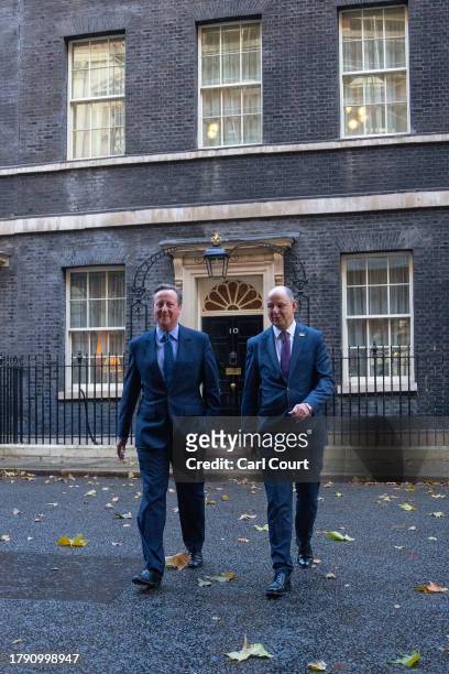 Britain's former Prime Minister, David Cameron leaves 10 Downing Street with Sir Philip Barton, the Permanent Under-Secretary of the Foreign,...
