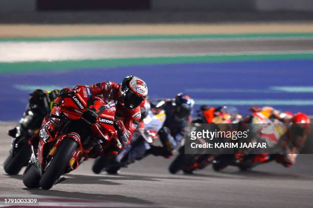 Ducati Lenovo Team's Italian rider Francesco Bagnaia competes during the Moto GP Grand Prix of Qatar at the Lusail International Circuit, in the city...