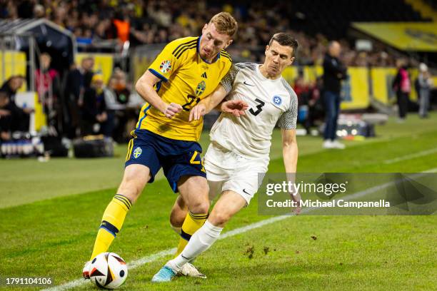 Sweden's Dajen Kulusevski against Estonia's Artur Pikk during the UEFA EURO 2024 European qualifier match between Sweden and Estonia at Friends Arena...