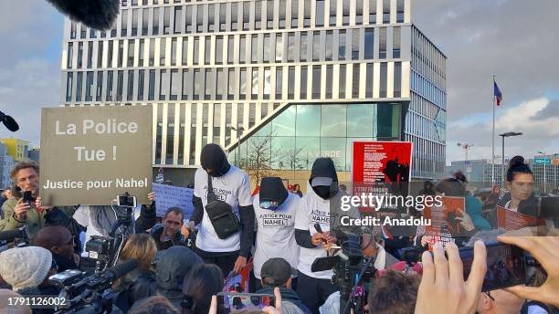 Hundreds of protesters wearing white t-shirts gather to protest against the release of a police officer, who killed 17-year-old Nahel on June, in...