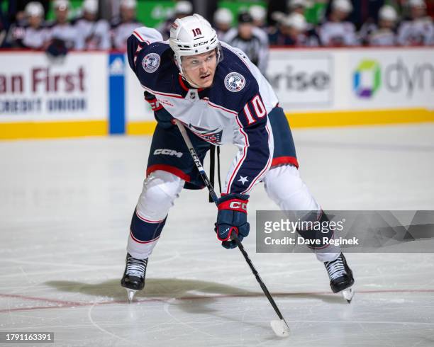 Dmitri Voronkov of the Columbus Blue Jackets gets set for the face-off against the Detroit Red Wings during the second period at Little Caesars Arena...
