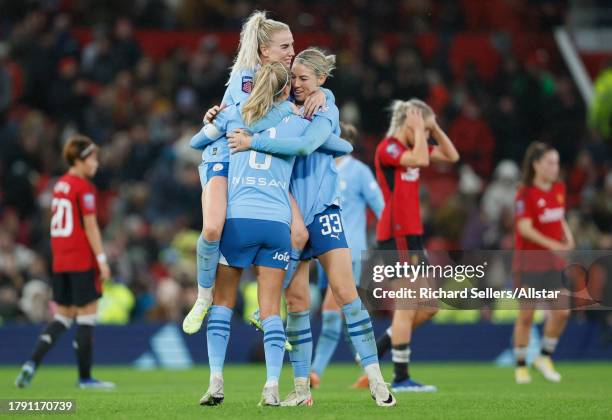 Alex Greenwood, Steph Houghton, and Alanna Kennedy of Manchester City celebrate after winning the Barclays Women´s Super League match between...