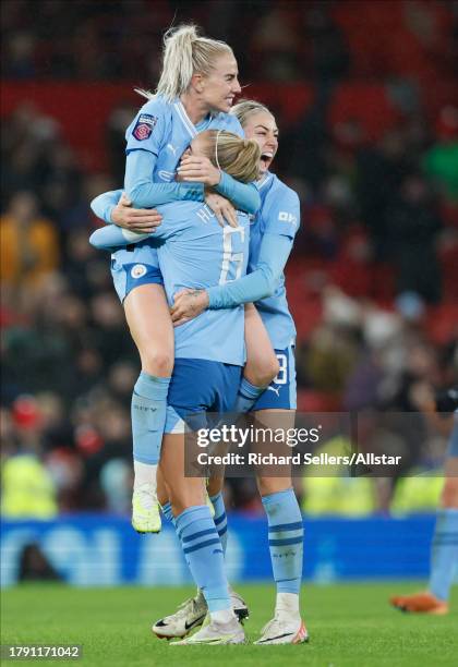 Alex Greenwood, Steph Houghton, and Alanna Kennedy of Manchester City celebrate after winning the Barclays Women´s Super League match between...