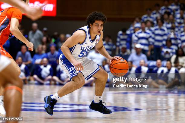 Spencer Hubbard of the Duke Blue Devils moves the ball during the game against the Bucknell Bison at Cameron Indoor Stadium on November 17, 2023 in...