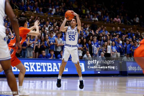 Spencer Hubbard of the Duke Blue Devils puts up a three-point shot during the game against the Bucknell Bison at Cameron Indoor Stadium on November...