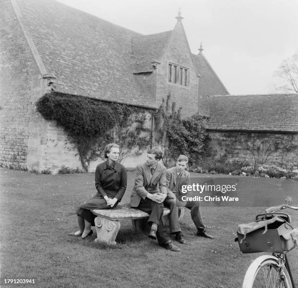 Princess Alice, Duchess of Gloucester , with her sons Prince William and Prince Richard seated on a bench at Barnwell Manor, the family home in...