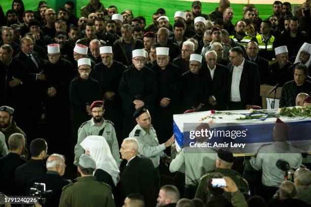 Family and friends grieve for Israeli-Druze soldier, Major Jamal Abbas, who was killed in the Gaza Strip, during his funeral on November 19, 2023 in...