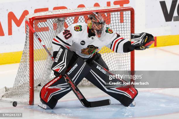 Goaltender Arvid Soderblom of the Chicago Blackhawks warms up prior to the game against the Florida Panthers at the Amerant Bank Arena on November...