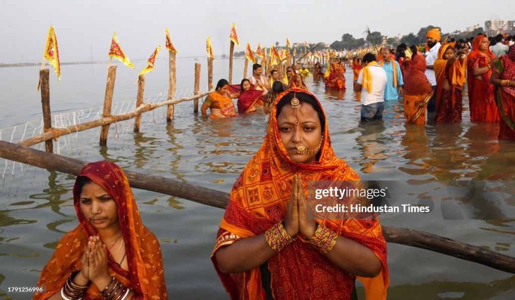 Chhatt Chhath devotees perform rituals in Ganga river on the occasion of ...