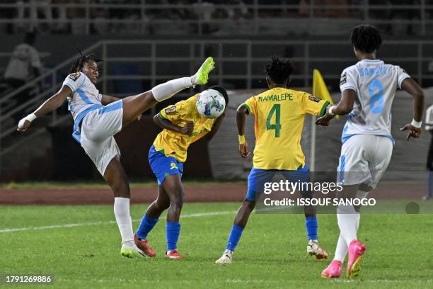 Sporting Casablanca's Adjoa Kokora Sylviane fights for the ball with Mamelodi Sundowns' #3 Karabo Makhurubetshi during the Confederation of African...