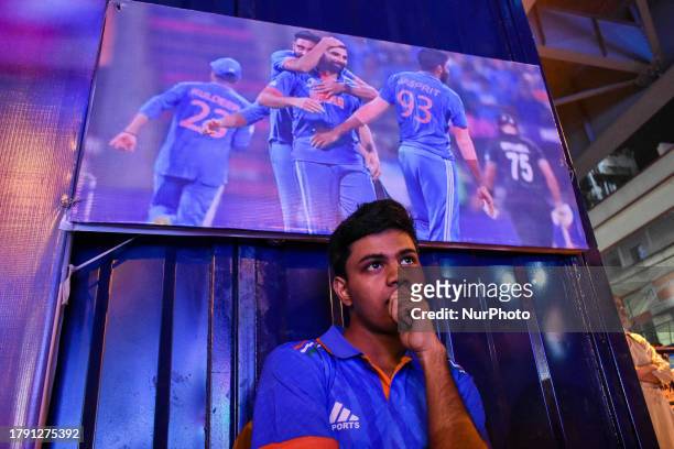 Fans are seen watching final of ICC World cup 2023 on a giant screen at a street in Kolkata , India , on 19 November 2023 . Australia defeated India...