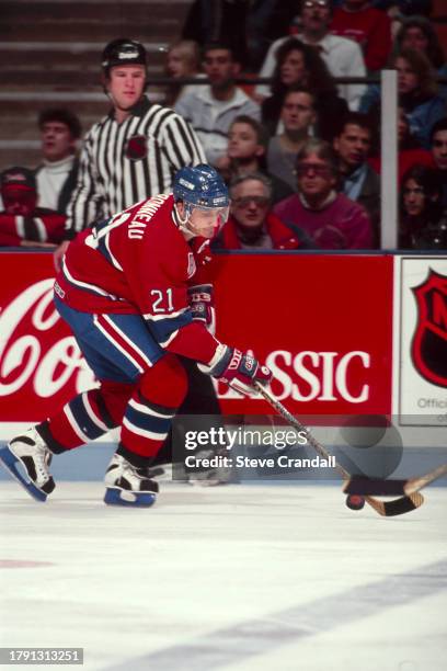 Montreal Canadiens forward, Guy Carbonneau, races up ice with the puck during the game against the NJ Devils at the Meadowlands Arena ,East...