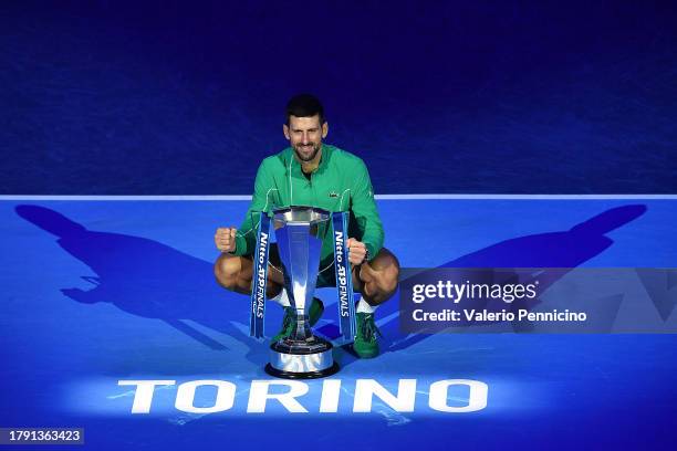 Novak Djokovic of Serbia poses for a photo with the Nitto ATP Finals trophy after victory against Jannik Sinner of Italy in the Men's Singles Finals...