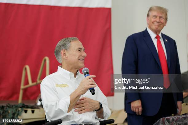 Texas Governor Greg Abbott gives remarks with Former President Donald Trump at the South Texas International airport on November 19, 2023 in...