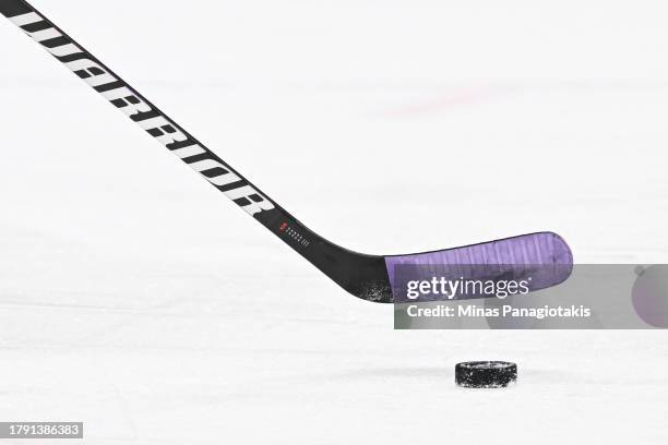Purple tape on a stick for Hockey Fights Cancer during warmups between the Montreal Canadiens and the Vancouver Canucks at the Bell Centre on...