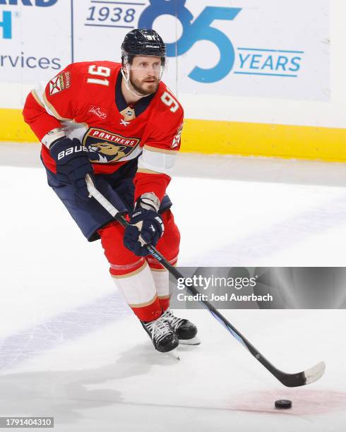 Oliver Ekman-Larsson of the Florida Panthers skates with the puck against the Chicago Blackhawks at the Amerant Bank Arena on November 12, 2023 in...