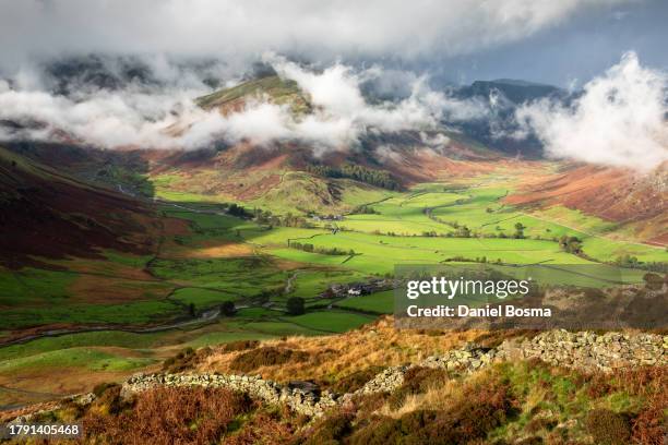 the lush and green langdale valley surrounded by mountains, taken from lingmore fell - lingmoor fell stock pictures, royalty-free photos & images