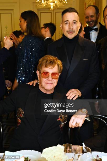 Sir Elton John and David Furnish attend The 67th Evening Standard Theatre Awards at Claridge's Hotel on November 19, 2023 in London, England.