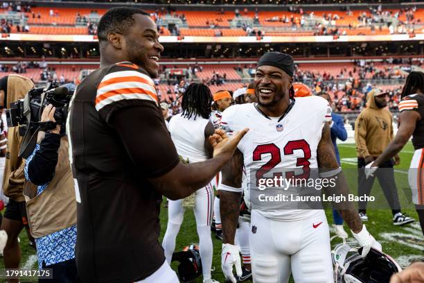 Amari Cooper of the Cleveland Browns talks to Corey Clement of the Arizona Cardinals after the game at Cleveland Browns Stadium on November 5, 2023...