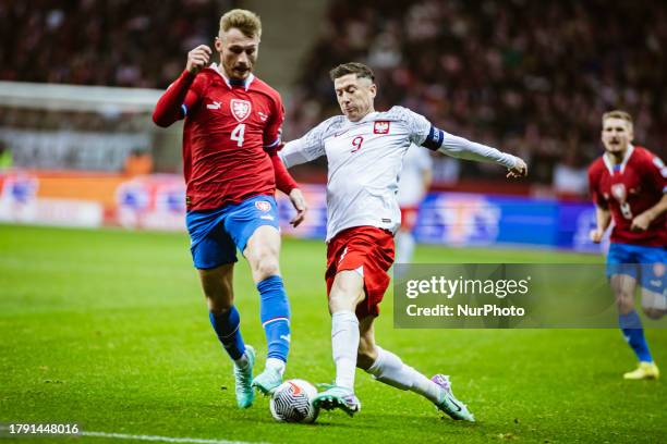 Jakub Brabec and Robert Lewandowski during football game : Poland vs Czechia on National Stadium in Warsaw, Poland, on November 17, 2023.