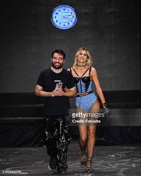 Fashion designer Pedro Andrade and Camila de Queiroz Toledo walk the runway during the Bold Strap fashion show as part of the Sao Paulo Fashion Week...