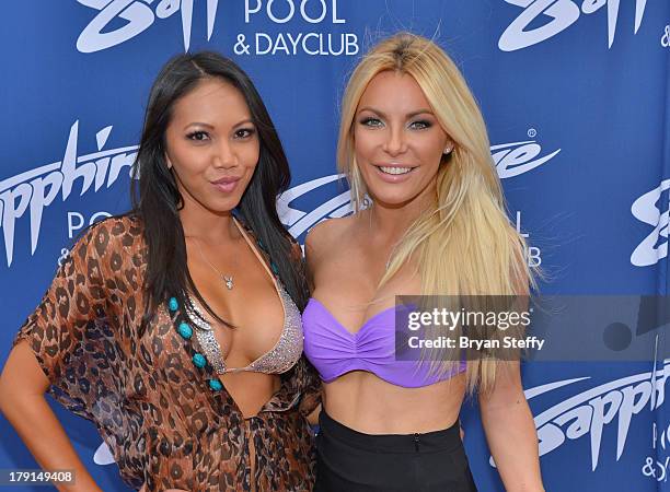 Sister-in-law's model Caya Hefner and television personality/model/DJ Crystal Hefner arrive at the Sapphire Pool & Dayclub as Crystal hosts Labor Day...