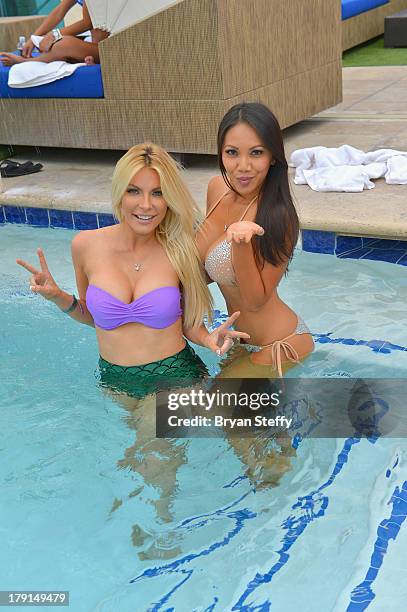 Sister-in-law's television personality/model/DJ Crystal Hefner and model Caya Hefner appear at the Sapphire Pool & Dayclub as Crystal hosts Labor Day...