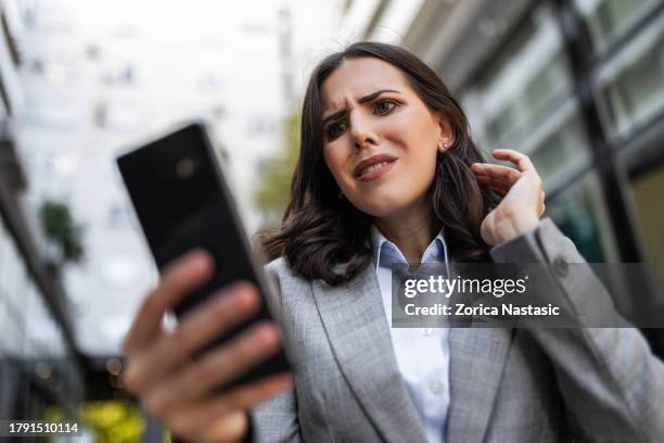 stressed businesswoman venting frustration - distraught stock pictures, royalty-free photos & images