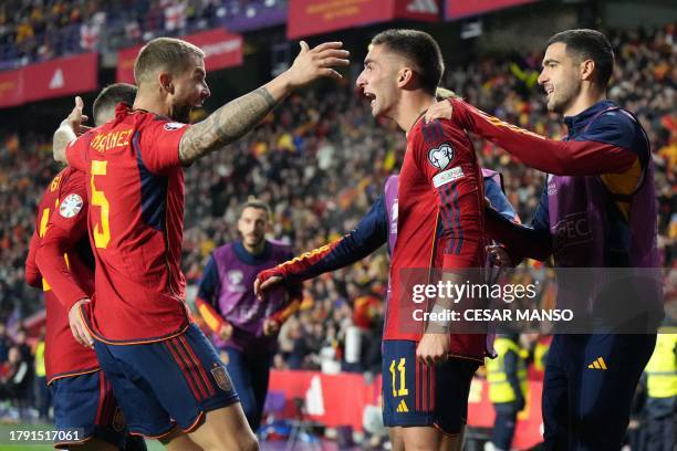 Spain's midfielder Ferran Torres celebrates scoring his team's second goal during the UEFA Euro 2024 group A qualifying football match between Spain...