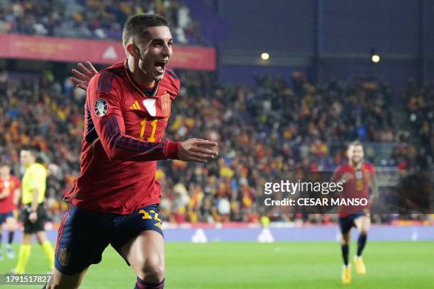 Spain's midfielder Ferran Torres celebrates scoring his team's second goal during the UEFA Euro 2024 group A qualifying football match between Spain...