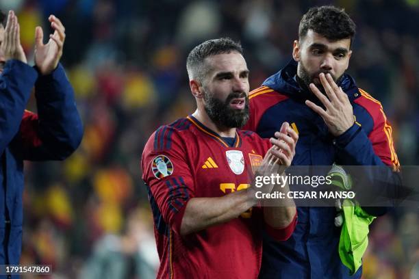 Spain's defender Dani Carvajal claps at the end of the UEFA Euro 2024 group A qualifying football match between Spain and Georgia at the Jose...