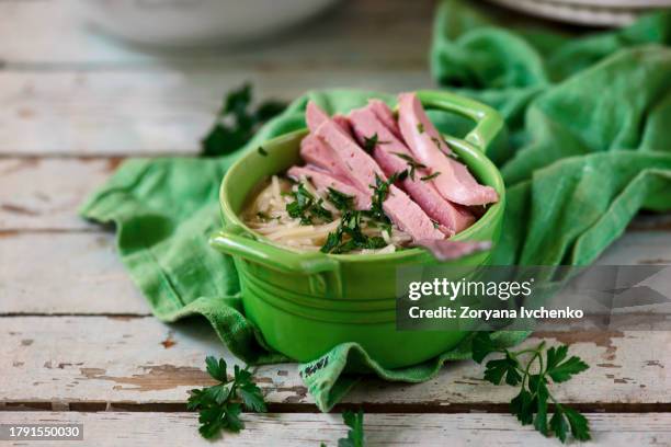 broth with omelet and sausages - hühnerbrühe stock-fotos und bilder