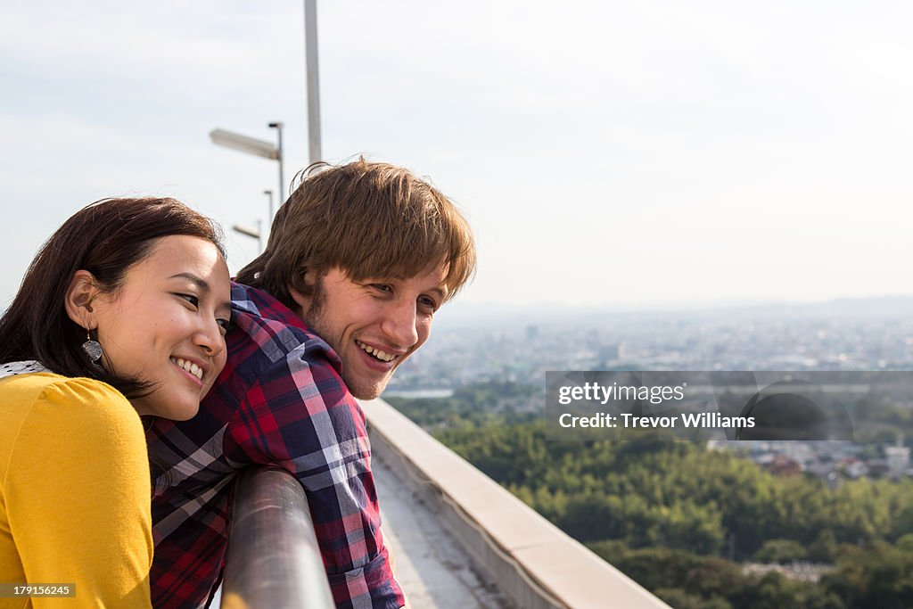 A couple at a viewpoint bonding