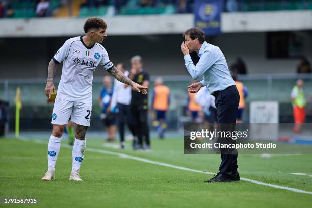 Rudi Garcia, Head Coach of Napoli SSC talks with his player Giovanni Di Lorenzo of Napoli SSC during the Serie A TIM match between Hellas Verona FC...