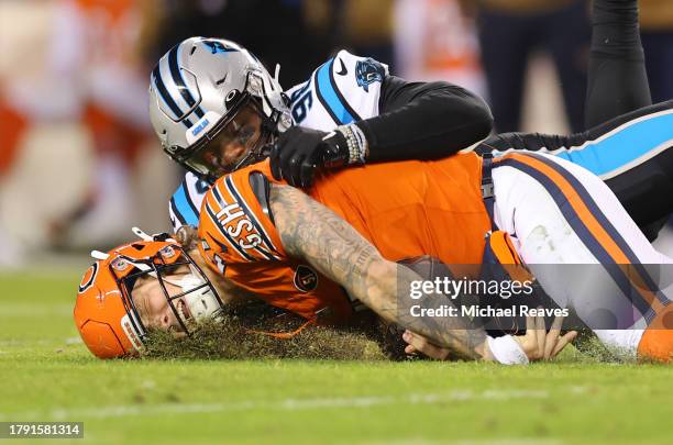Marquis Haynes Sr. #98 of the Carolina Panthers tackles Tyson Bagent of the Chicago Bears during the second quarter at Soldier Field on November 09,...