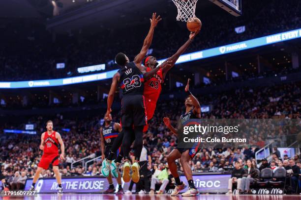 Pascal Siakam of the Toronto Raptors drives to the net by Jaden Ivey of the Detroit Pistons during the first half of the game at Scotiabank Arena on...