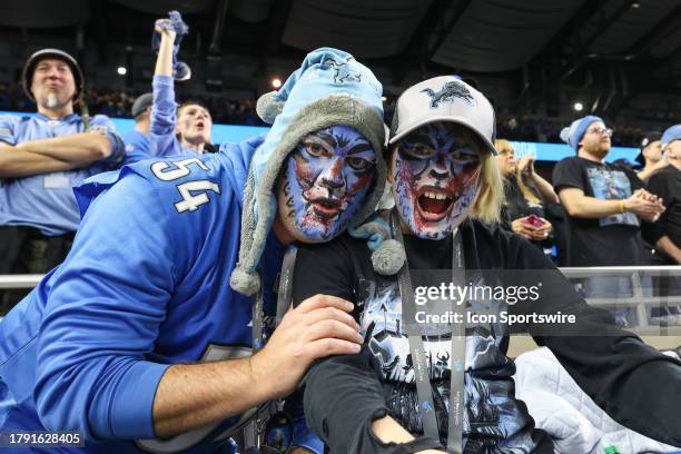 Detroit Lions fans celebrate a come-from-behind win during an NFL football game between the Chicago Bears and the Detroit Lions on November 19, 2023...