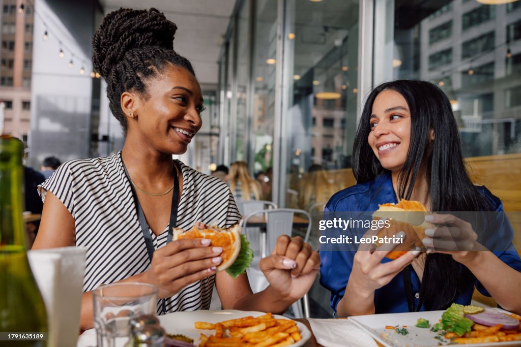 Women in business enjoying lunch break together