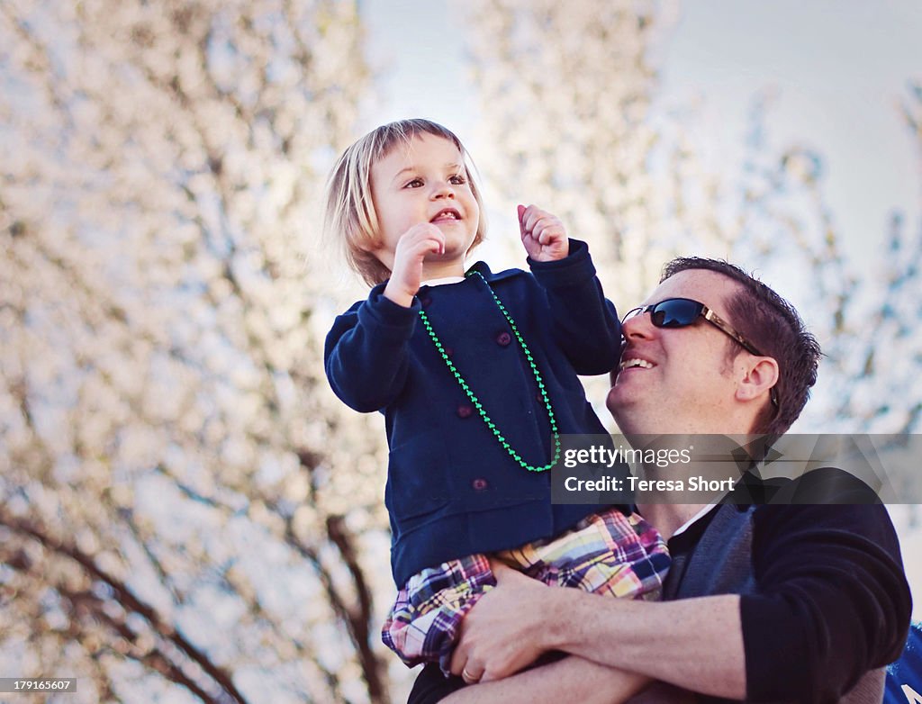 Young Girl on Father's Shoulders