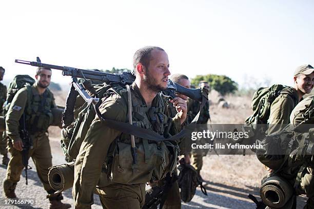 Israeli soldiers during a military exercise on September 1, 2013 near the border with Syria, in the Israeli-annexed Golan Heights. Tension's are...