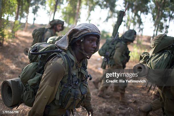 Israeli soldiers during a military exercise on September 1, 2013 near the border with Syria, in the Israeli-annexed Golan Heights. Tension's are...